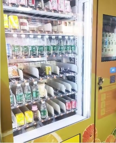 Puerta de aislamiento patentada y lista digital en la máquina expendedora automática para durabilidad y comodidad