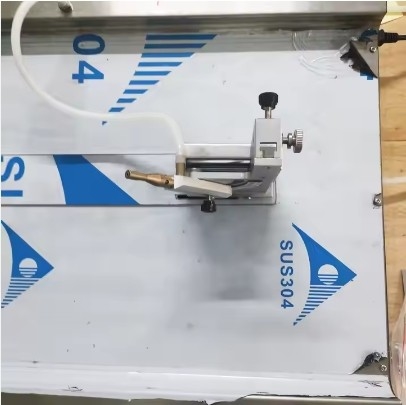 Pruebador de retardante de llama de tejidos de alto rendimiento para materiales textiles y de juguete con una amplia gama de tejidos orientados verticalmente