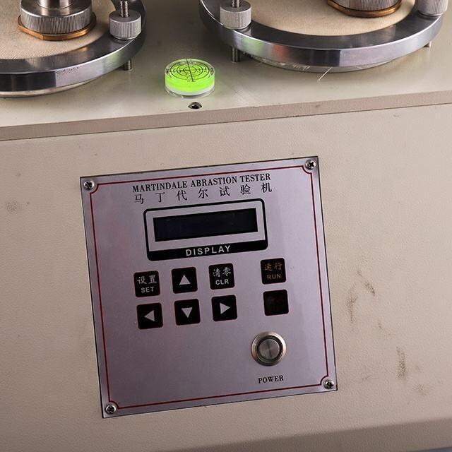 Probador de abrasión Martindale de alta precisión con 8 cabezales de prueba para el cumplimiento de normas internacionales